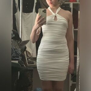 White fitted ruched halter dress. Only worn Once. Excellent condition.